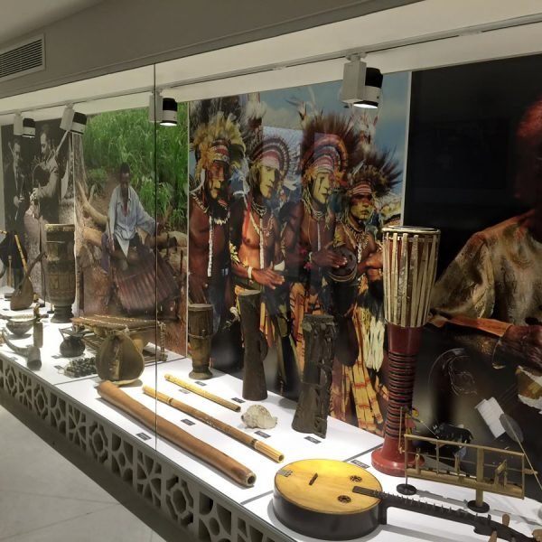 Museum display with musical instruments.